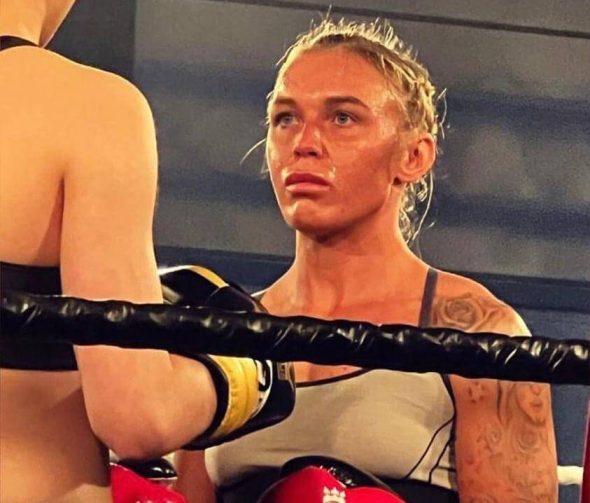 Ashleigh Johnson staring at her opponent in the ring.