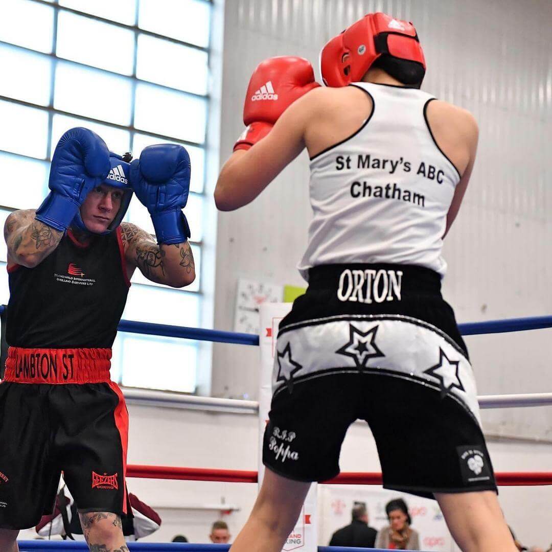 Louise Orton in an amateur boxing bout.